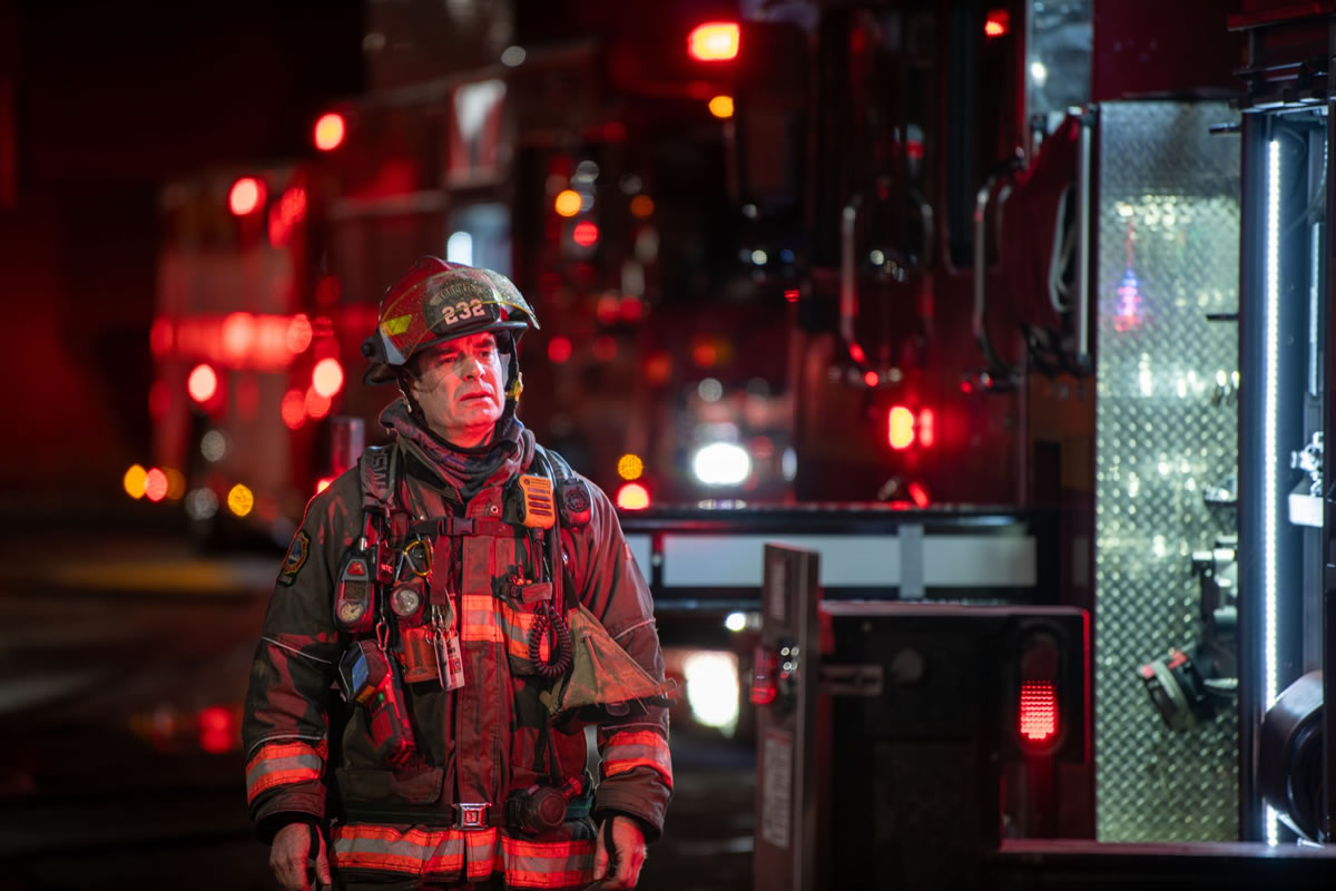 Firefighter walking toward camera. Photo by @ jeremyreigber
